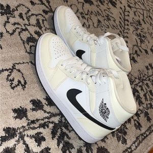 Air Jordan’s coconut milk mid length